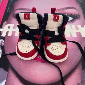 Red and black Jordan’s sneakers